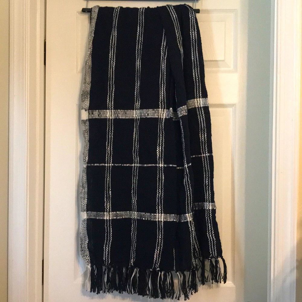 Black and white blanket with fringe